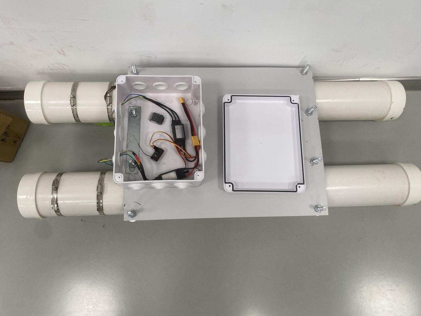 Top view of the vessel with the wired electronics bay open and the sealed science enclosure mounted beside it
